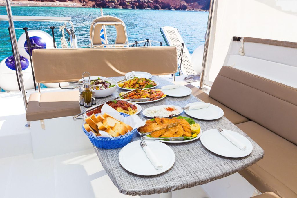Enjoy Greek flavours on board Santorini sunset cruises with dinner 