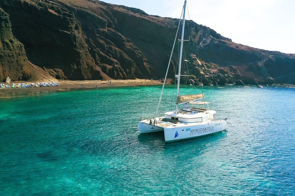 Santorini sunset cruises with dinner on a catamaran by Spiridakos Sailing