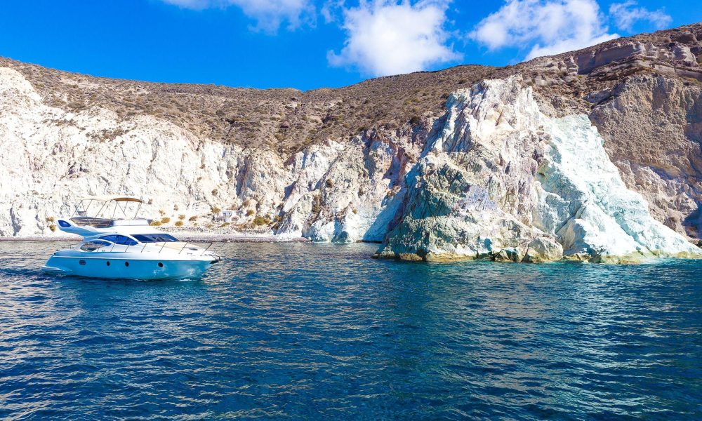 Cruising along the White Beach and cliffs is one thing to do during your 4 days in Santorini.