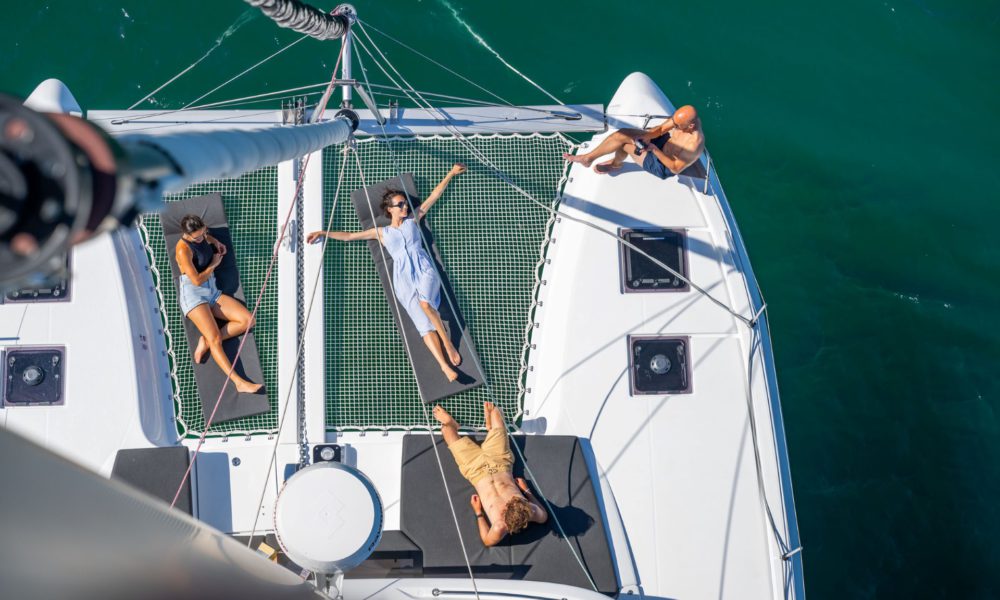 Enjoying the catamaran deck of Spiridakos Sailing Cruises, voted Best Experience in Greece 2026 by TripAdvisor. 