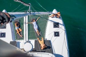 Enjoying the catamaran deck of Spiridakos Sailing Cruises, voted Best Experience in Greece 2026 by TripAdvisor. 