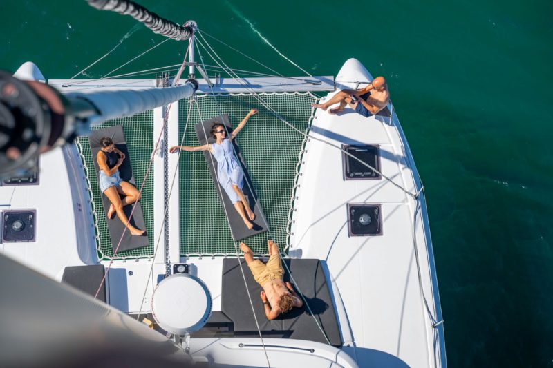 Enjoying the catamaran deck of Spiridakos Sailing Cruises, voted Best Experience in Greece 2026 by TripAdvisor. 